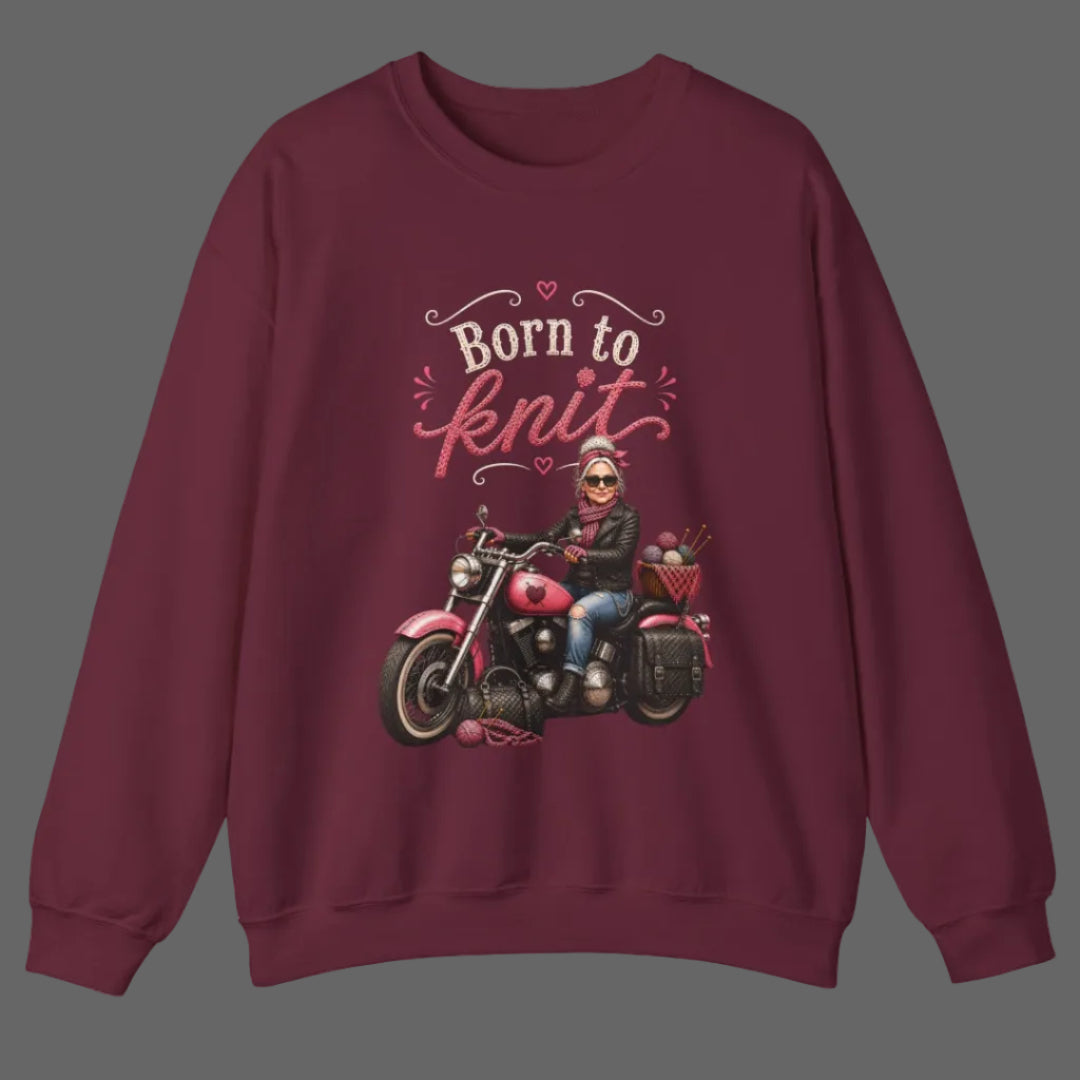 Maroon sweatshirt with a graphic of a person on a motorcycle and 'Born to Knit' text.