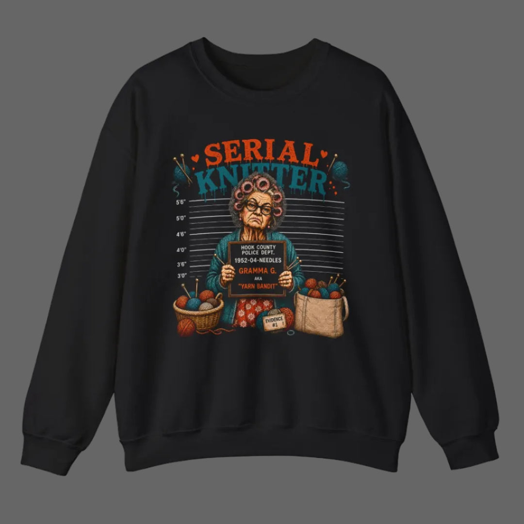 Black sweatshirt with 'Serial Knitter' graphic design on a white background