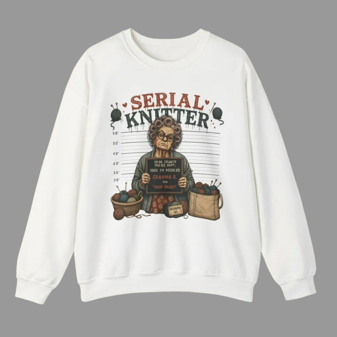 White sweatshirt with 'Serial Knitter' graphic design on a white background