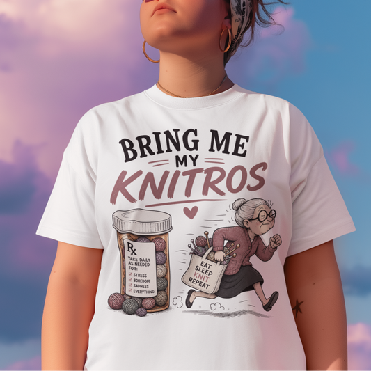 Person wearing a t-shirt with a graphic design and text against a colorful sky.